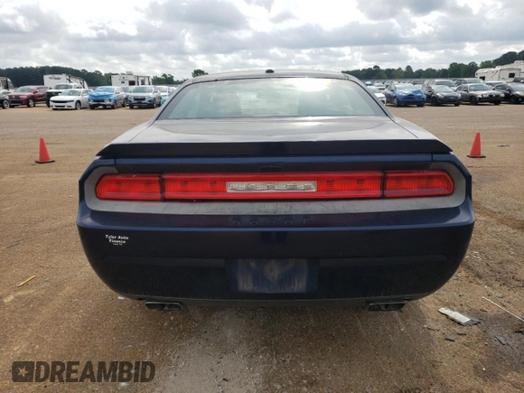 2013 Dodge Challenger SXT z VIN 2C3CDYAG3DH578949, wystawiony jako Copart lot #54664815 z przebiegiem 205 376 mil mil oraz Szkody całkowita. Historia ofert i sprzedaży dostępna na DreamBid. Obrazek 6.