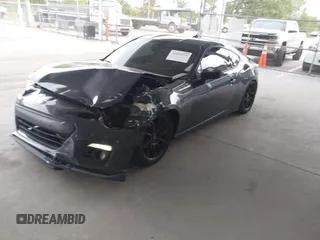 2013 Subaru BRZ Limited with VIN JF1ZCAC14D1604116, listed as a IAAI auction lot 42404911 with 117,061 mi miles and . Bid and sale history available at DreamBid. Image 2.