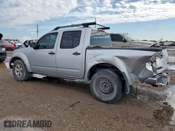 2013 Nissan Frontier SV with VIN 1N6AD0EVXDN732221, listed as a Copart auction lot 58527155 with 129,763 mi miles and Salvage title. Bid and sale history available at DreamBid. Image 2.