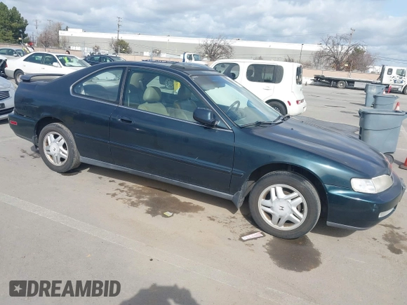 1997 Honda Accord EX with VIN 1HGCD7158VA014025, listed as a IAAI auction lot 41582343 with 302,660 mi miles and . Bid and sale history available at carsss.com. Image 1.