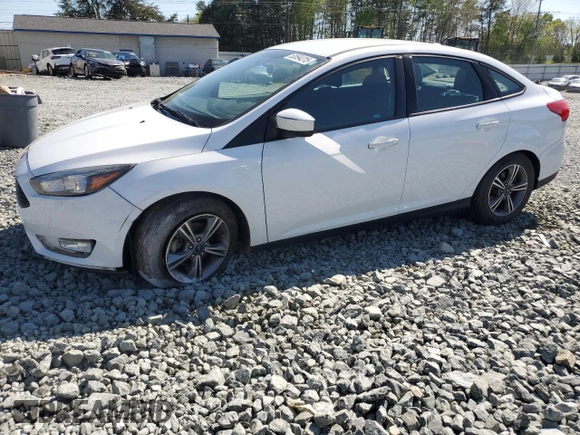 2018 Ford Focus SE with VIN 1FADP3FE4JL220247, listed as a Copart auction lot 52694315 with 25,285 mi miles and Salvage Title. Bid and sale history available at carsss.com. Image 1.