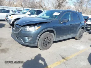 2013 Mazda CX-5 Touring with VIN JM3KE2CE6D0122405, listed as a IAAI auction lot 41743037 with 154,647 mi miles and . Bid and sale history available at carsss.com. Image 2.