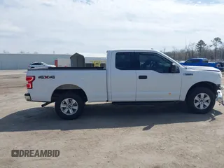 2018 Ford F-150 XL with VIN 1FTEX1EB4JFA77373, listed as a IAAI auction lot 41813197 with 235,251 mi miles and . Bid and sale history available at DreamBid. Image 14.