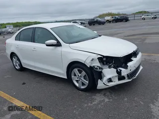 2014 Volkswagen Jetta TDI w/Premium with VIN 3VWLL7AJXEM372547, listed as a IAAI auction lot 42320105 with 113,200 mi miles and . Bid and sale history available at DreamBid. Image 1.