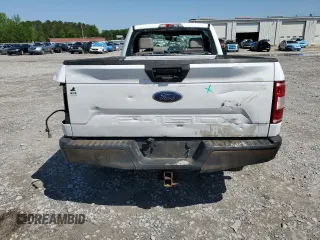 2018 Ford F-150 XL with VIN 1FTMF1CB2JKC31099, listed as a Copart auction lot 52078995 with 219,569 mi miles and Salvage title. Bid and sale history available at DreamBid. Image 6.