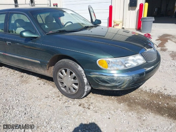 2000 Lincoln Continental with VIN 1LNHM97VXYY759969, listed as a IAAI auction lot 41892082 with 114389 miles. Bid and sale history available at carsss.com. Image 6.