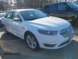 2015 Ford Taurus SEL z VIN 1FAHP2E81FG129234, wystawiony jako IAAI lot #41821200 z przebiegiem 163 888 mil mil oraz . Historia ofert i sprzedaży dostępna na DreamBid. Obrazek 1.