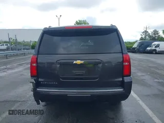 2015 Chevrolet Suburban LTZ with VIN 1GNSKKKC4FR589913, listed as a IAAI auction lot 42017190 with 216,145 mi miles. Bid and sale history available at carsss.com. Image 16.