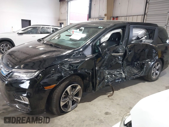 2018 Honda Odyssey Touring with VIN 5FNRL6H87JB105410, listed as a IAAI auction lot 41860707 with 91,908 mi miles. Bid and sale history available at carsss.com. Image 19.
