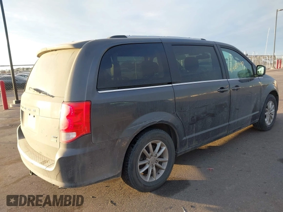 2019 Dodge Grand Caravan SXT with VIN 2C4RDGCG0KR633684, listed as a IAAI auction lot 41460470 with 101,801 mi miles. Bid and sale history available at carsss.com. Image 4.