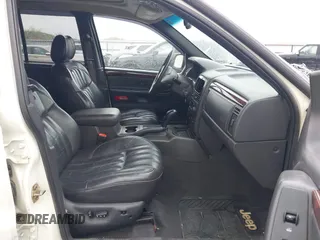 2000 Jeep Grand Cherokee Limited with VIN 1J4GW58N8YC336316, listed as a IAAI auction lot 42409398 with 168,230 mi miles and . Bid and sale history available at DreamBid. Image 5.