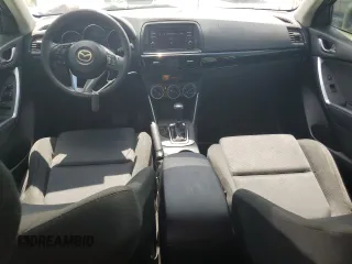 2015 Mazda CX-5 Sport z VIN JM3KE2BE6F0546994, wystawiony jako Copart lot #61948075 z przebiegiem 111 845 mil mil oraz Czysty tytuł • Clean title. Historia ofert i sprzedaży dostępna na DreamBid. Obrazek 8.