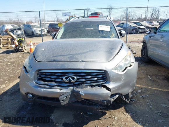 2011 Infiniti FX z VIN JN8AS1MW1BM733922, wystawiony jako IAAI lot #41779209 z przebiegiem 174 575 mil mil oraz . Historia ofert i sprzedaży dostępna na DreamBid. Obrazek 13.