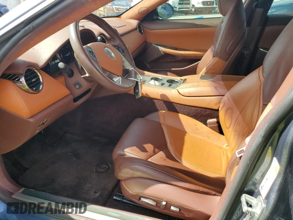 2012 Fisker Karma EcoSport z VIN YH4K14AA3CA001524, wystawiony jako Copart lot #74501534 z przebiegiem 15 969 mil mil oraz Nie do naprawy. Historia ofert i sprzedaży dostępna na DreamBid. Obrazek 7.