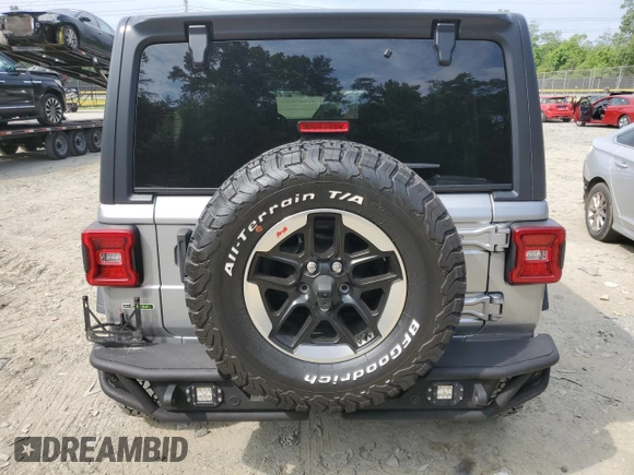 2020 Jeep Wrangler Unlimited Sport with VIN 1C4HJXDM5LW208799, listed as a Copart auction lot 61701954 with 33,873 mi miles and Salvage title. Bid and sale history available at DreamBid. Image 6.