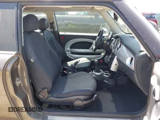2006 MINI Hardtop with VIN WMWRC33566TJ76689, listed as a IAAI auction lot 42408697 with 153,382 mi miles and . Bid and sale history available at DreamBid. Image 5.