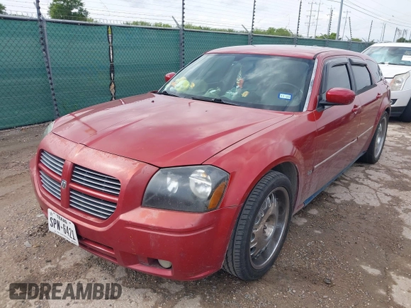2005 Dodge Magnum SE with VIN 2D4FV48V35H677391, listed as a IAAI auction lot 42109681 with 115,939 mi miles. Bid and sale history available at carsss.com. Image 2.