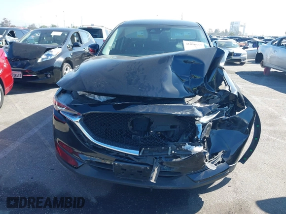 2017 Mazda CX-5 Touring with VIN JM3KFACL2H0146213, listed as a IAAI auction lot 41626112 with 77,829 mi miles and . Bid and sale history available at carsss.com. Image 12.