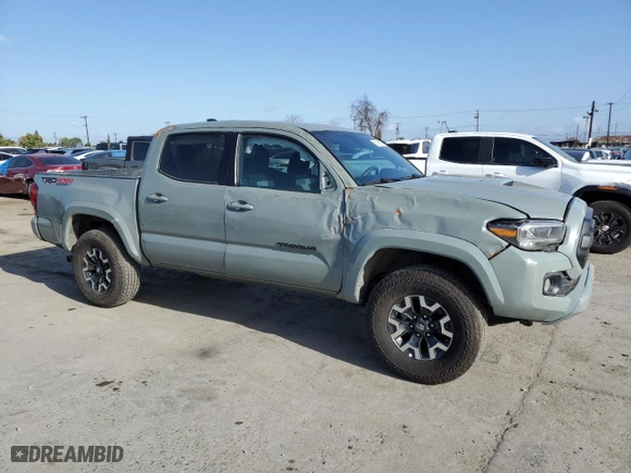 2023 Toyota Tacoma 4WD SR with VIN 3TMCZ5AN5PM538629, listed as a Copart auction lot 51848135 with 30,672 mi miles and Salvage Title. Bid and sale history available at carsss.com. Image 4.