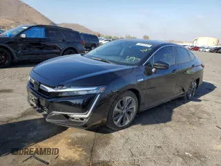 2021 Honda Clarity with VIN JHMZC5F13MC001142, listed as a Copart auction lot 65222432 with 60,968 mi miles. Bid and sale history available at carsss.com. Image 2.