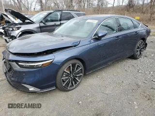 2025 Honda Accord Touring with VIN 1HGCY2F85SA007443, listed as a Copart auction lot 51209985 with 5,592 mi miles and Salvage title. Bid and sale history available at DreamBid. Image 1.