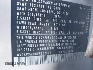 2013 Volkswagen Tiguan S z VIN WVGAV3AX0DW562532, wystawiony jako IAAI lot #42737494 z przebiegiem 152 549 mil mil oraz . Historia ofert i sprzedaży dostępna na DreamBid. Obrazek 9.