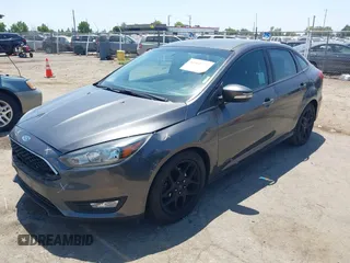 2016 Ford Focus SE z VIN 1FADP3F25GL329217, wystawiony jako IAAI lot #42461772 z przebiegiem 85 070 mil mil oraz . Historia ofert i sprzedaży dostępna na DreamBid. Obrazek 2.