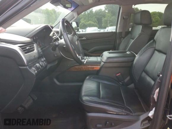 2015 Chevrolet Suburban LTZ with VIN 1GNSKKKC1FR624679, listed as a Copart auction lot 52957365 with 71,194 mi miles and Salvage Title. Bid and sale history available at DreamBid. Image 7.