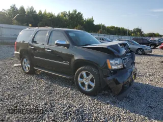 2014 Chevrolet Tahoe LTZ z VIN 1GNSCCE0XER103558, wystawiony jako Copart lot #67590424 z przebiegiem Nie podano mil oraz Szkoda całkowita • Salvage title. Historia ofert i sprzedaży dostępna na DreamBid. Obrazek 4.