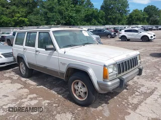 1991 Jeep Cherokee Limited z VIN 1J4FT58S4ML635077, wystawiony jako IAAI lot #42457021 z przebiegiem 291 614 mil mil oraz . Historia ofert i sprzedaży dostępna na DreamBid. Obrazek 1.