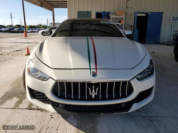 2018 Maserati Ghibli with VIN ZAM57XSA3J1273909, listed as a Copart auction lot 68951253 with 59,308 mi miles. Bid and sale history available at carsss.com. Image 5.