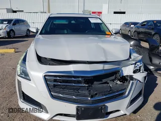 2019 Cadillac CTS RWD with VIN 1G6AP5SX0K0121219, listed as a IAAI auction lot 41239899 with 84,588 mi miles and . Bid and sale history available at DreamBid. Image 12.