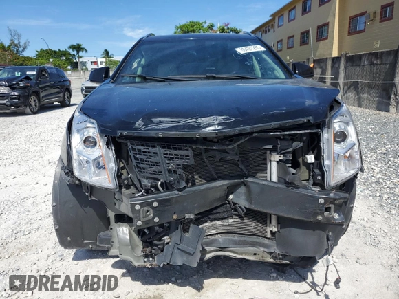 2016 Cadillac SRX Luxury Collection with VIN 3GYFNBE37GS523443, listed as a Copart auction lot 60421285 with 71,148 mi miles and Salvage title. Bid and sale history available at DreamBid. Image 5.