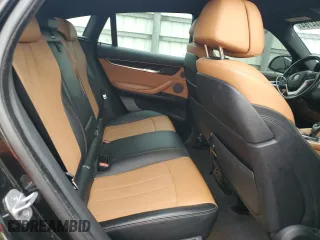 2017 BMW X6 sDrive35i with VIN 5UXKU0C36H0G69163, listed as a Copart auction lot 87044784 with 99,452 mi miles and Salvage Title. Bid and sale history available at carsss.com. Image 12.