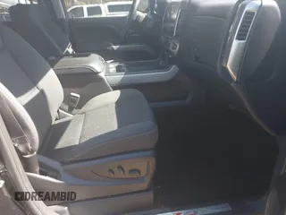 2017 Chevrolet Silverado 1500 LT with VIN 3GCUKREC1HG358752, listed as a IAAI auction lot 41775110 with 150,528 mi miles and . Bid and sale history available at DreamBid. Image 5.