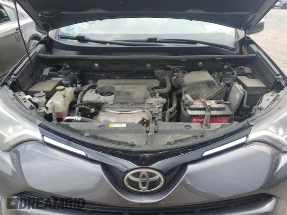 2017 Toyota RAV4 LE with VIN 2T3BFREV4HW591330, listed as a Copart auction lot 64726745 with 93,909 mi miles and Salvage title. Bid and sale history available at DreamBid. Image 12.