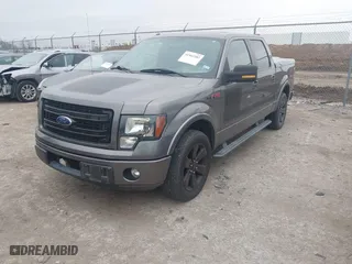 2013 Ford F-150 XL with VIN 1FTFW1CT7DFB60657, listed as a IAAI auction lot 41562282 with 121,633 mi miles. Bid and sale history available at carsss.com. Image 17.