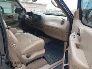1999 Ford F-150 XL z VIN 2FTRX08L8XCA05595, wystawiony jako IAAI lot #42219555 z przebiegiem 213 636 mil mil oraz . Historia ofert i sprzedaży dostępna na DreamBid. Obrazek 5.