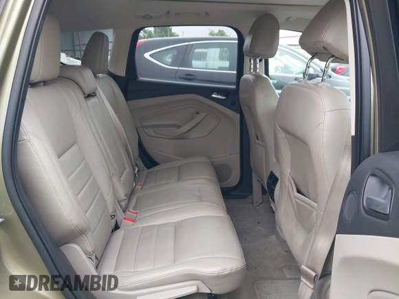 2013 Ford Escape SEL with VIN 1FMCU9H9XDUB61880, listed as a IAAI auction lot 42271136 with 115,837 mi miles and . Bid and sale history available at DreamBid. Image 8.