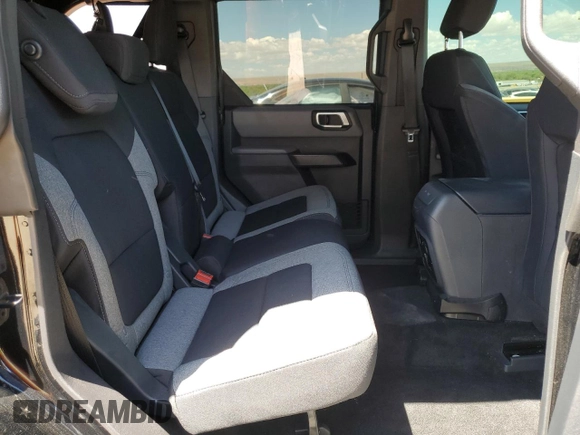 2022 Ford Bronco with VIN 1FMDE5BH7NLB14159, listed as a Copart auction lot 54911305 with 20,539 mi miles and Salvage title. Bid and sale history available at DreamBid. Image 11.
