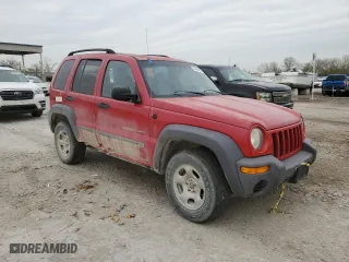 2003 Jeep Liberty Sport with VIN 1J4GL48K13W631130, listed as a Copart auction lot 51464875 with 196,771 mi miles and Salvage Title. Bid and sale history available at carsss.com. Image 4.
