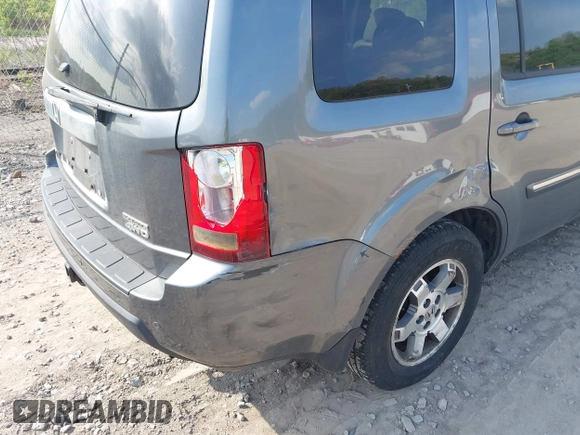 2011 Honda Pilot Touring with VIN 5FNYF4H90BB103824, listed as a IAAI auction lot 42127137 with 243,858 mi miles and . Bid and sale history available at carsss.com. Image 6.