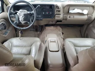 1997 GMC Suburban with VIN 3GKFK16R4VG519902, listed as a Copart auction lot 79031204 with 195,624 mi miles and Salvage Title. Bid and sale history available at DreamBid. Image 8.