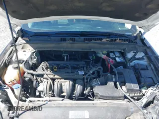 2018 Ford Fusion SE z VIN 3FA6P0H77JR142828, wystawiony jako IAAI lot #41820649 z przebiegiem 208 517 mil mil oraz . Historia ofert i sprzedaży dostępna na DreamBid. Obrazek 10.