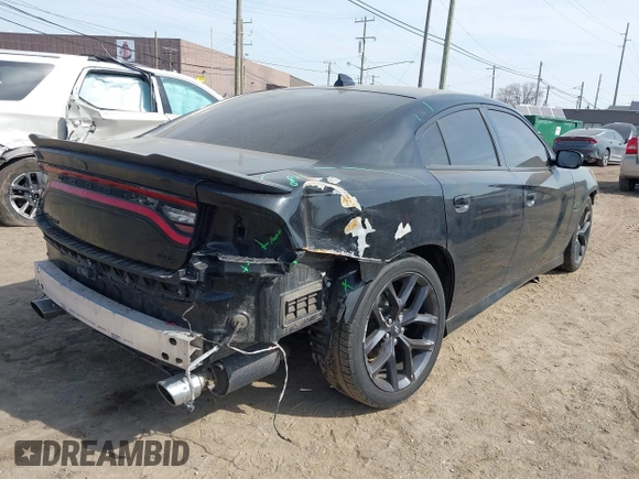 2020 Dodge Charger R/T with VIN 2C3CDXCTXLH145129, listed as a IAAI auction lot 41769766 with 56,213 mi miles and . Bid and sale history available at carsss.com. Image 4.