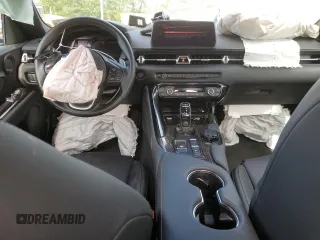 2023 Toyota Supra 3.0 z VIN WZ1DB0G02PW059707, wystawiony jako Copart lot #69791693 z przebiegiem 7559 mil mil oraz . Historia ofert i sprzedaży dostępna na DreamBid. Obrazek 8.