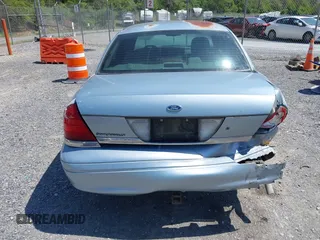 2007 Ford Crown Victoria LX z VIN 2FAFP74V37X122518, wystawiony jako IAAI lot #42071004 z przebiegiem 228 547 mil mil oraz . Historia ofert i sprzedaży dostępna na DreamBid. Obrazek 6.