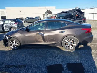 2016 Nissan Maxima SL with VIN 1N4AA6AP1GC448472, listed as a IAAI auction lot 41329749 with 152,644 mi miles and . Bid and sale history available at DreamBid. Image 13.