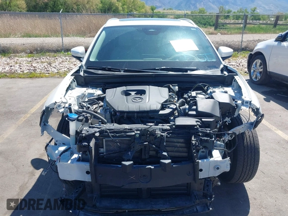 2024 Mazda CX-30 S Premium with VIN 3MVDMBDM8RM633580, listed as a IAAI auction lot 42152915 with 18,679 mi miles and . Bid and sale history available at DreamBid. Image 12.