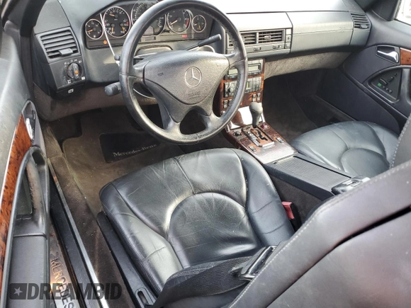 2001 Mercedes-Benz SL 500 with VIN WDBFA68F31F196516, listed as a Copart auction lot 50635005 with 61,682 mi miles and Salvage title. Bid and sale history available at DreamBid. Image 8.